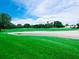 Gorgeous view of a sand trap on a golf course at 8681 Daydream St, Sarasota, FL 34238