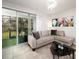 Cozy living room with sliding glass doors and stylish decor at 8681 Daydream St, Sarasota, FL 34238