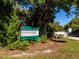 Culverhouse Nature Park sign surrounded by lush greenery at the entrance, inviting exploration at 8681 Daydream St, Sarasota, FL 34238