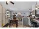 Charming kitchen boasts a center island, a separate dining area, and lots of natural light at 8719 Gaillard Ave, North Port, FL 34287