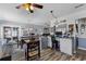 This open kitchen blends seamlessly into living spaces, enhancing the home's social atmosphere at 8719 Gaillard Ave, North Port, FL 34287