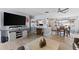Open living space seamlessly connects to the kitchen and dining area for easy and modern living at 8719 Gaillard Ave, North Port, FL 34287