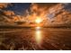 Gorgeous beach view showcasing the golden sunset and beautiful ocean waves at 8779 Midnight Pass Rd # 406H, Sarasota, FL 34242