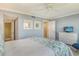 Spacious bedroom featuring ensuite bathroom and comfortable decor at 8779 Midnight Pass Rd # 406H, Sarasota, FL 34242