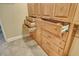 Ample storage provided by the beautiful custom wood closet system with shelving and drawers at 8779 Midnight Pass Rd # 406H, Sarasota, FL 34242
