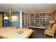 Game room with a pool table, lots of bookshelves, and comfortable chairs at 8779 Midnight Pass Rd # 406H, Sarasota, FL 34242