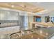 Kitchen with stainless appliances and breakfast bar at 8779 Midnight Pass Rd # 406H, Sarasota, FL 34242