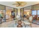 Relax on the lanai with a glass table and two chairs and enjoy the amazing water views at 8779 Midnight Pass Rd # 406H, Sarasota, FL 34242