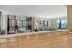 Living room with sliding glass doors to balcony at 8779 Midnight Pass Rd # 406H, Sarasota, FL 34242