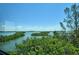 Enjoy the amazing water views from this condo featuring gorgeous natural vegetation and a clear blue sky at 8779 Midnight Pass Rd # 406H, Sarasota, FL 34242