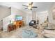 Comfortable living room with plush seating, TV, and stylish decor, ideal for Gathering gatherings at 9743 Pembrooke Pines Dr, Sun City Center, FL 33573