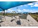 Well-maintained bocce ball courts with shaded seating, perfect for leisurely outdoor enjoyment and community interaction at 10240 Beach Dune Dr, Englewood, FL 34223
