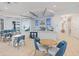Beautifully appointed cafe with comfortable seating and a well-stocked service counter, great for resident gathering at 10240 Beach Dune Dr, Englewood, FL 34223