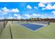 Well-maintained outdoor pickleball courts, providing a recreational amenity for residents and guests at 10240 Beach Dune Dr, Englewood, FL 34223