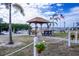 Community gazebo with seating offers a relaxing outdoor space overlooking the water and marina at 10315 Cortez W Rd # 32Bv, Bradenton, FL 34210