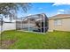 This home features a large screened-in pool and spacious backyard, great for outdoor living at 12710 Rockrose Gln, Lakewood Ranch, FL 34202