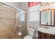 Tiled walk-in shower, vanity, and window with blinds in bathroom at 12710 Rockrose Gln, Lakewood Ranch, FL 34202