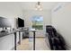 Cozy office featuring a large window, and a comfortable massage chair at 12710 Rockrose Gln, Lakewood Ranch, FL 34202