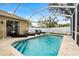 Relax by the pool in this beautiful screened-in lanai, featuring ample seating and privacy at 12710 Rockrose Gln, Lakewood Ranch, FL 34202