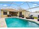 Enjoy the screened-in pool and lounge area, perfect for relaxing and entertaining outdoors at 12710 Rockrose Gln, Lakewood Ranch, FL 34202