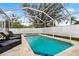 Enjoy the privacy of this screened-in pool area with a spacious deck and comfortable lounge chairs at 12710 Rockrose Gln, Lakewood Ranch, FL 34202