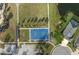 Aerial view of the community basketball court, sidewalk, and landscaping at 12726 Rainwashed Loop, Parrish, FL 34219