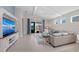 Bright and open living room with high ceilings and access to the outdoor lanai at 12726 Rainwashed Loop, Parrish, FL 34219