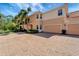 Inviting two-story home boasting a lush landscape and a spacious two-car garage at 130 Bella Vista Ter # 10A, Nokomis, FL 34275
