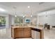 Spacious kitchen island offers generous counter space, perfect for entertaining at 130 Bella Vista Ter # 10A, Nokomis, FL 34275