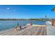 Waterfront dock with bench overlooking the tranquil water at 1444 Ridgewood Ln, Sarasota, FL 34231
