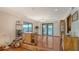 Stylish living area featuring a bar, waterfront views, and a cozy atmosphere perfect for entertaining at 1444 Ridgewood Ln, Sarasota, FL 34231