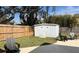 Backyard area featuring a storage shed, patio and seating area at 1715 Thomas Dr, Clearwater, FL 33759