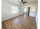 Bedroom with a ceiling fan and double-door closet at 1715 Thomas Dr, Clearwater, FL 33759