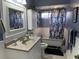 Charming bathroom featuring a classic clawfoot tub and modern vanity, with wainscoting at 1805 Springwood Dr, Sarasota, FL 34232