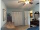 Bright bedroom features tiled floor and ample closet space and vanity at 1805 Springwood Dr, Sarasota, FL 34232