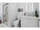 Clean bathroom featuring a glass shower, modern vanity, and contemporary finishes at 1909 Field Rd, Sarasota, FL 34231