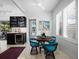 Bright dining area with modern decor, stylish chairs, and a wine bar, perfect for entertaining at 1909 Field Rd, Sarasota, FL 34231
