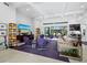 Spacious living room with modern furnishings, high ceilings, and seamless indoor-outdoor flow at 1909 Field Rd, Sarasota, FL 34231