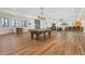 Expansive game room with bar area, living area, and pool table for entertainment at 1930 Bayshore Dr, Englewood, FL 34223