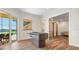 Game room with foosball table, access to outdoors, and a glimpse of the bathroom at 1930 Bayshore Dr, Englewood, FL 34223