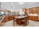 Open concept kitchen with a center island, custom cabinets and stainless steel appliances at 1930 Bayshore Dr, Englewood, FL 34223
