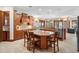 Kitchen featuring custom cabinets, granite countertops, and a large center island at 1930 Bayshore Dr, Englewood, FL 34223