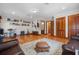 Open-concept living room with hardwood floors and comfortable seating area at 1930 Bayshore Dr, Englewood, FL 34223