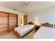 Bedroom with twin beds, built-in bookcase, and a classic aesthetic at 2402 Scenic Dr, Venice, FL 34293