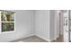Minimalist bedroom with tile flooring, and bright window view at 2538 Fireflag Ln, Sarasota, FL 34232