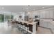 Open concept kitchen with stainless steel appliances and large central island at 2538 Fireflag Ln, Sarasota, FL 34232