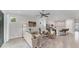 Open concept living space with stainless steel appliances and a comfortable seating area at 2538 Fireflag Ln, Sarasota, FL 34232