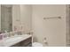 Bathroom with granite countertop, tile floors, and walk-in shower at 261 Portofino Dr, North Venice, FL 34275