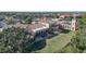 Expansive lawn, backyard patio, and beautiful community amenities at 261 Portofino Dr, North Venice, FL 34275