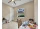 Study/office area featuring a large window for plenty of natural light at 261 Portofino Dr, North Venice, FL 34275